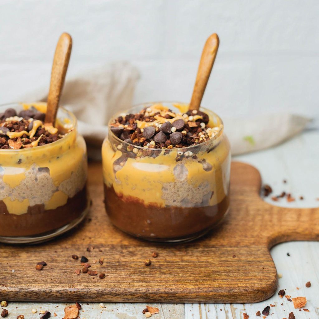Chocolate, peanut butter and avocado mousse in jars