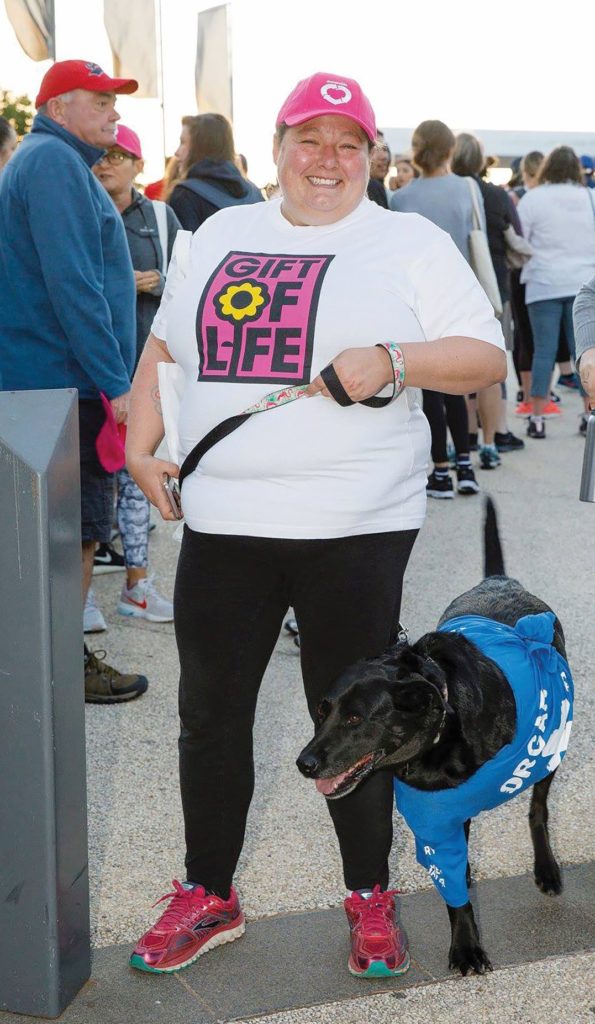 woman and her three legged dog at the Donate Life walk