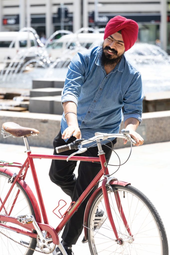 Jegdeep Singh with his bike after the helmet laws were introduced