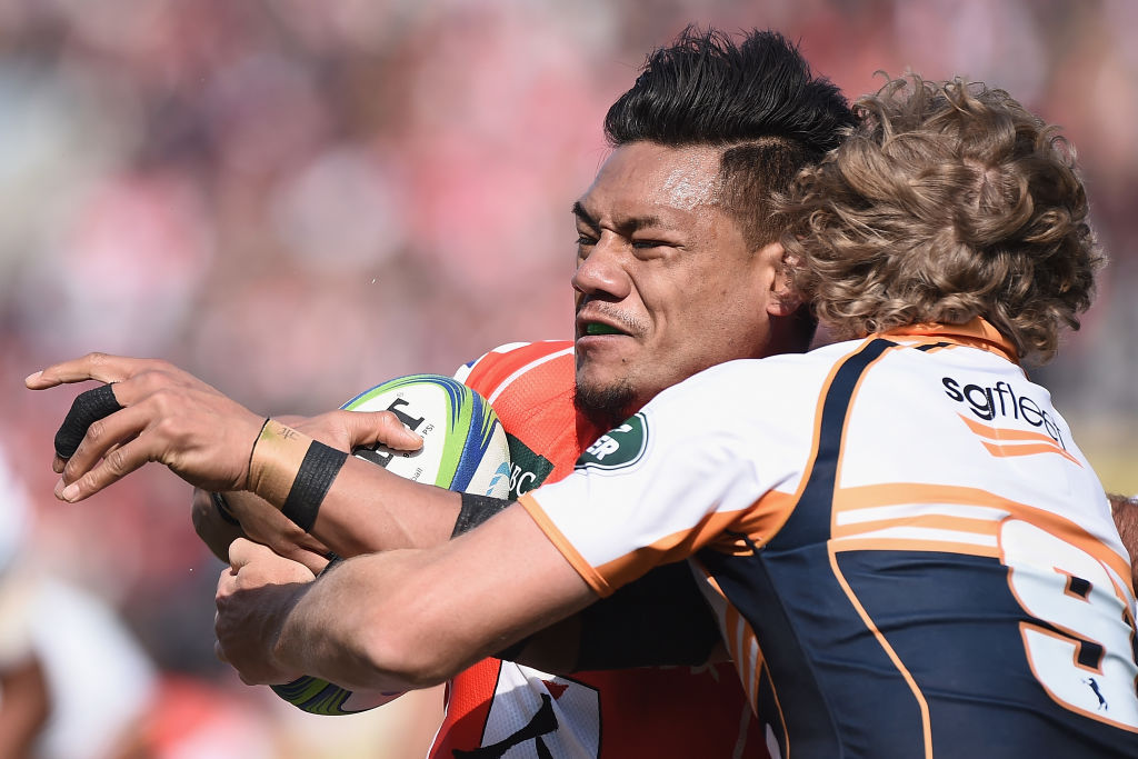 TOKYO, JAPAN - FEBRUARY 24:  Lomano Lava Lemeki of the Sunwolves is tackled by Joe Powell of the Brumbies during the Super Rugby round 2 match between Sunwolves and Brumbies at the Prince Chichibu Memorial Ground on February 24, 2018 in Tokyo, Japan.  (Photo by Matt Roberts/Getty Images for Sunwolves)
