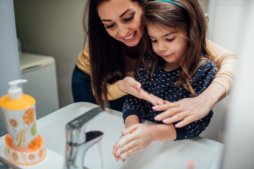new reality for kids washing their hands with mum