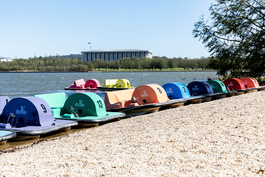 ACT Tourism operators paddleboats by the lake
