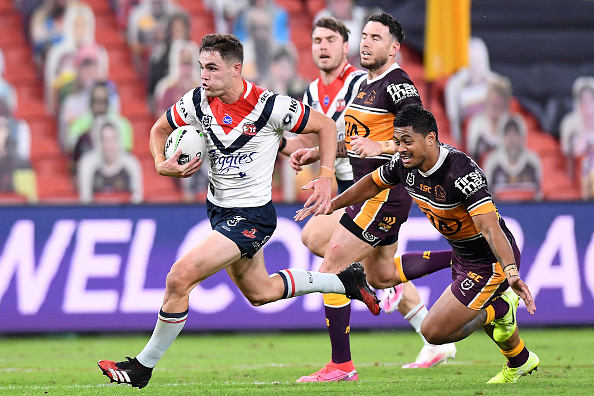 NRL Round 4 - Broncos v Roosters Kyle Flanagan of the Roosters makes a break to score a try during the round four NRL match between the Brisbane Broncos and the Sydney Roosters at Suncorp Stadium on June 04, 2020 in Brisbane, Australia.