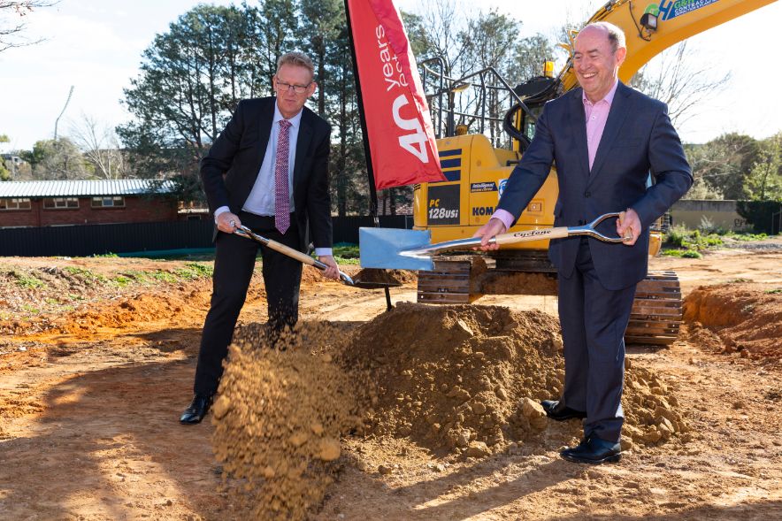 Morris Property Group director Barry Morris (right) turns the sod to officially start construction on the Renaissance, alongside Liberal MLA and Shadow Planning and Housing Minister, Mark Parton.