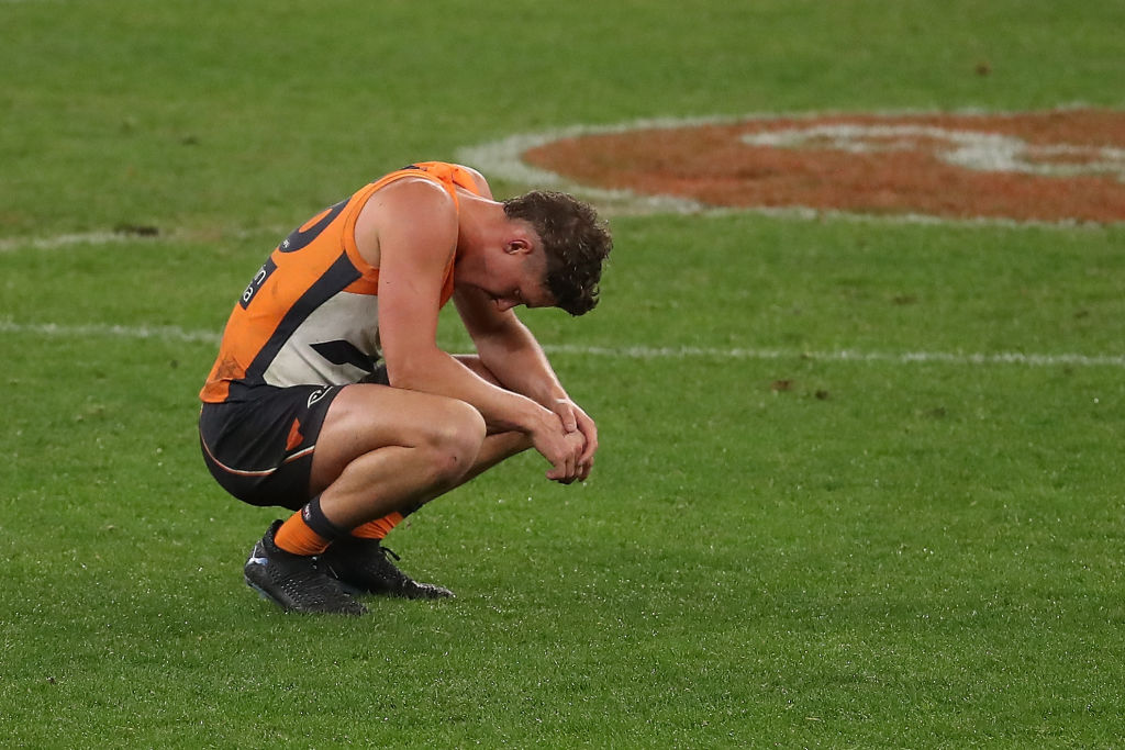 harry perryman kneeling in disappointment