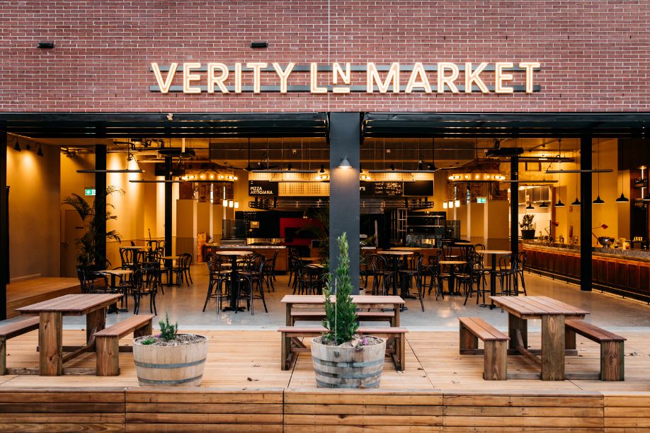 The front facade of Verity Lane Market food hall with outdoor seating
