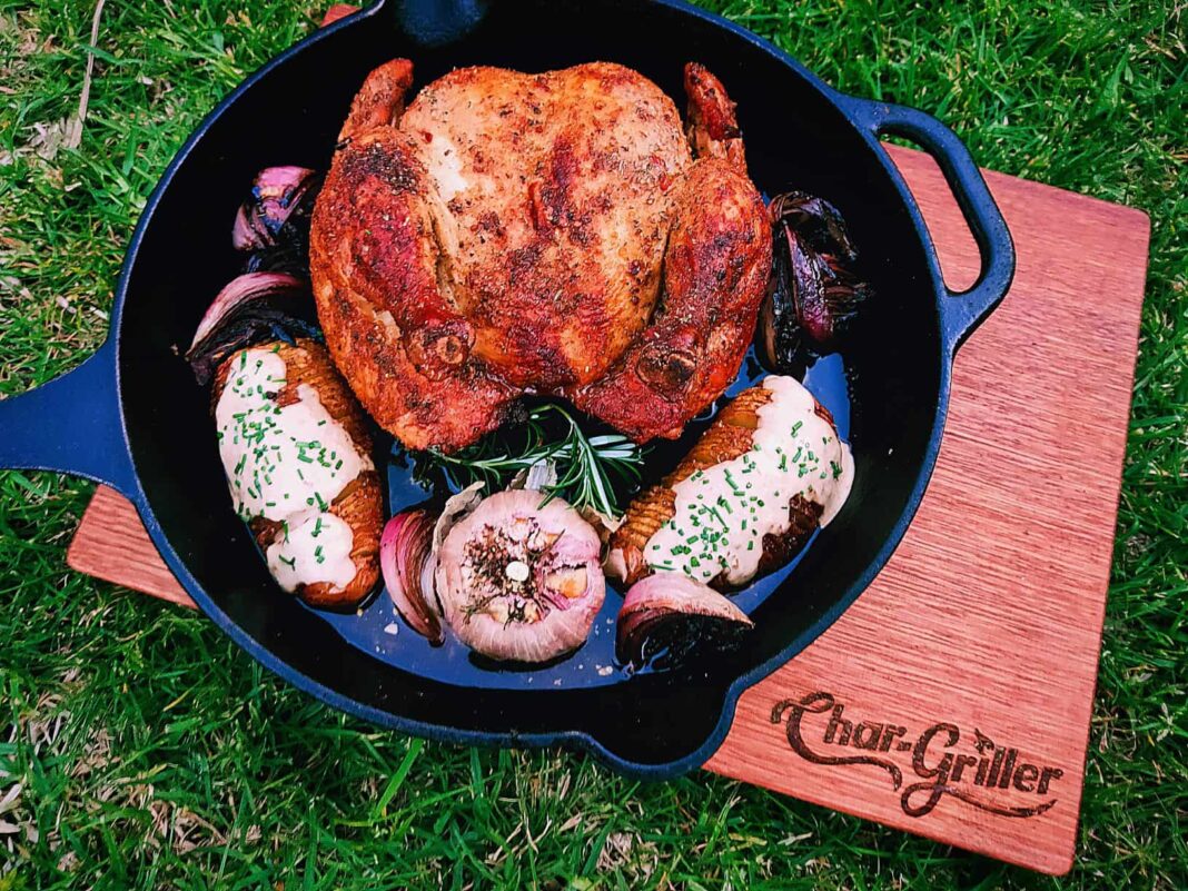 bbq chicken in a pot on the grass
