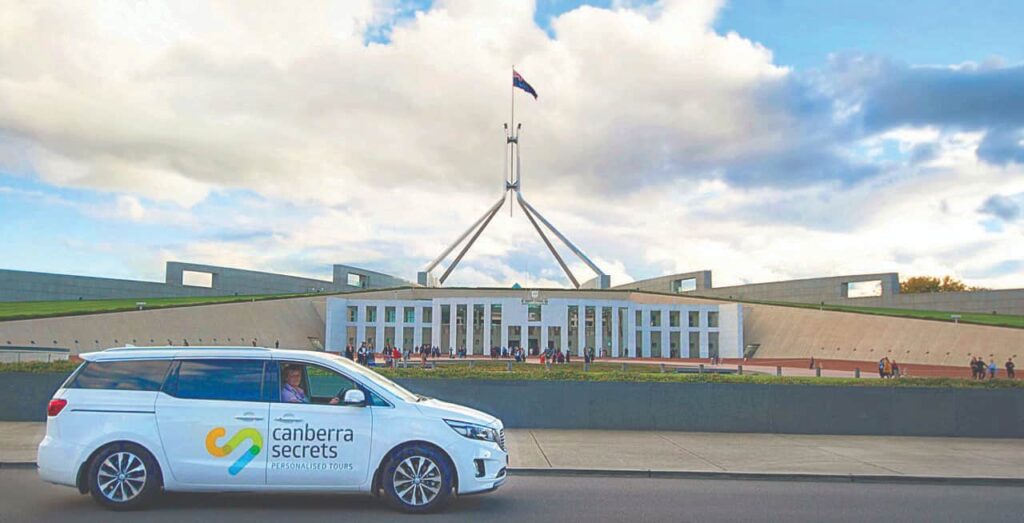 canberra secrets car in front of parliament house