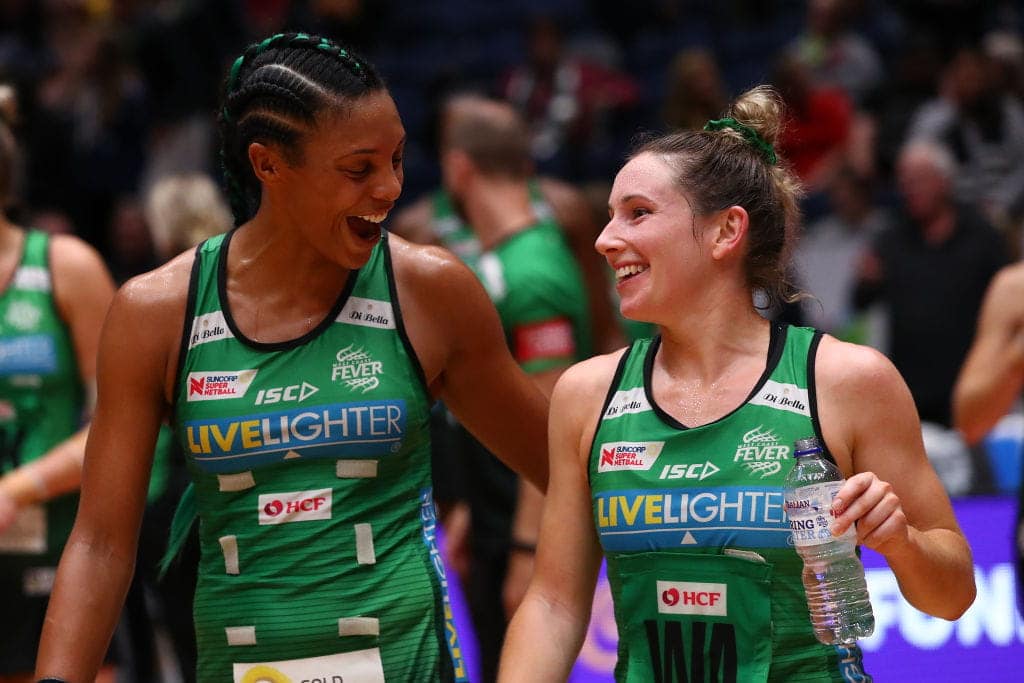 two West Coast Fever players embracing