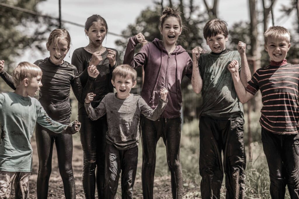 kids with mud on them