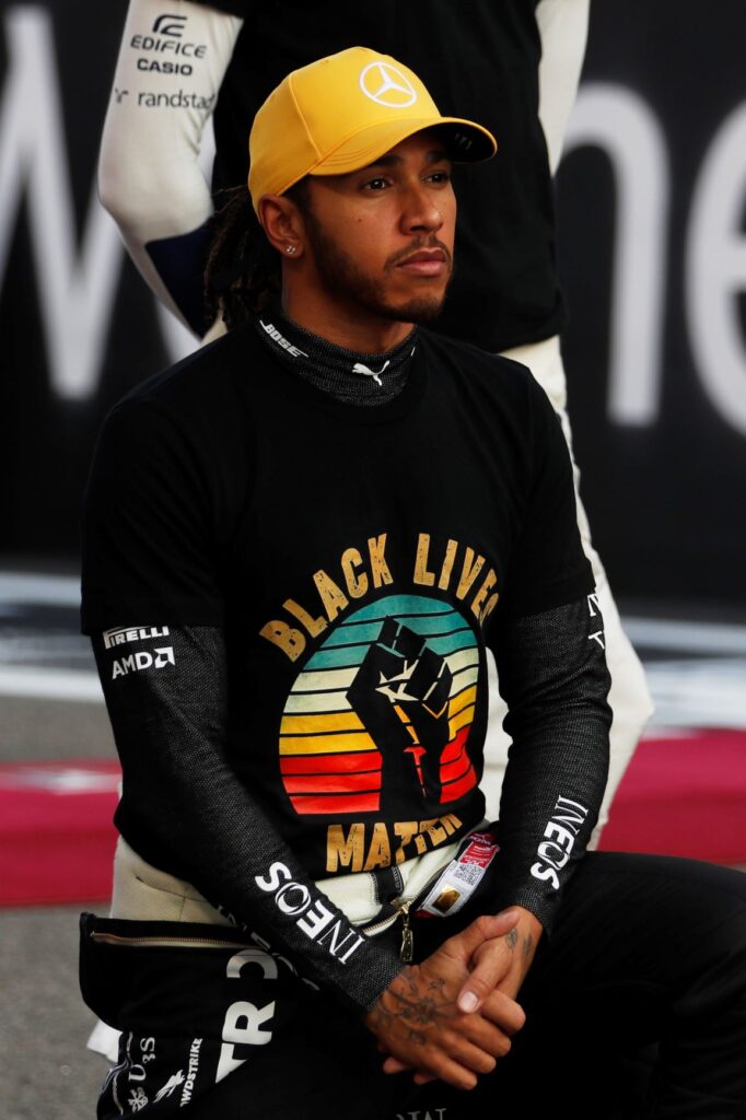 Lewis Hamilton kneeling