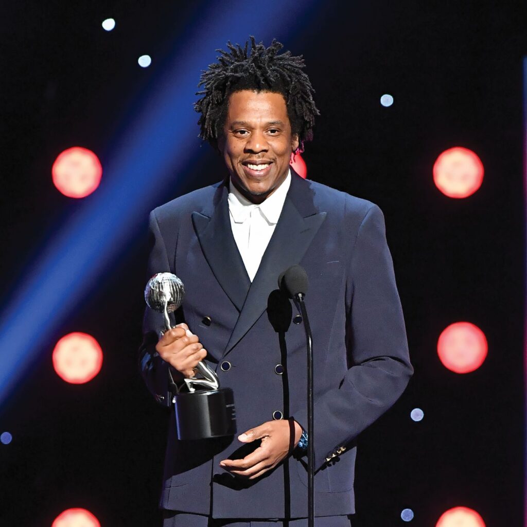 Jay-Z holding an award