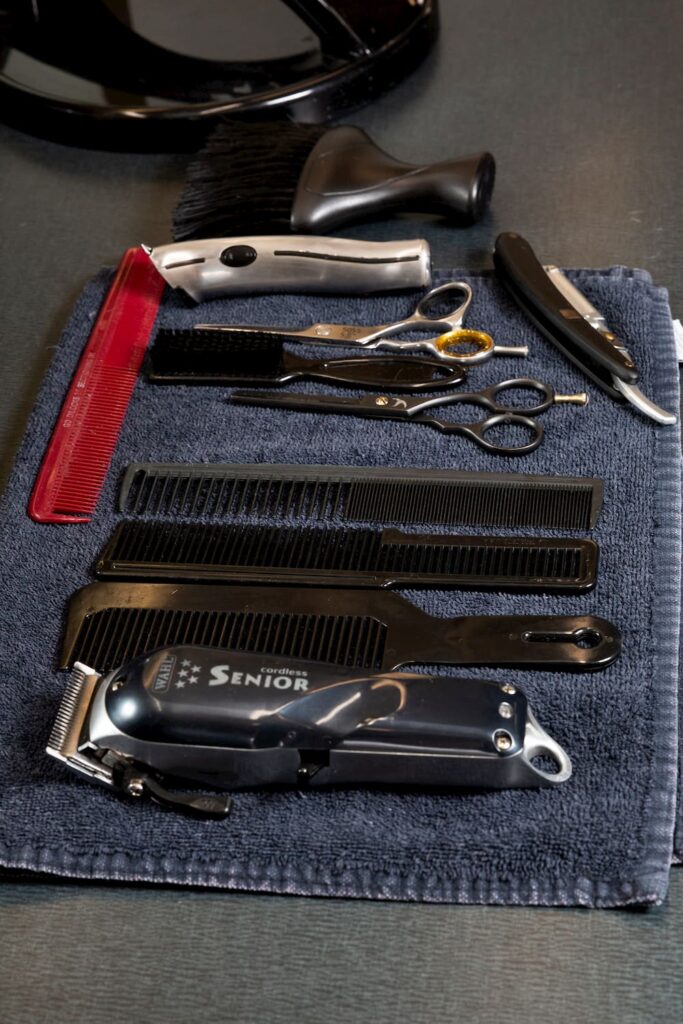Scissors, combs and clippers are a barbers tools. 
