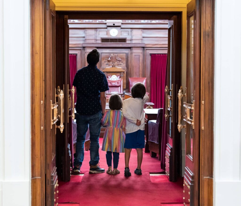 family standing in a doorway