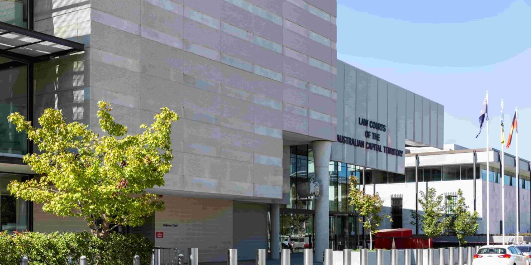 modern concrete and glass exterior of ACT law courts building