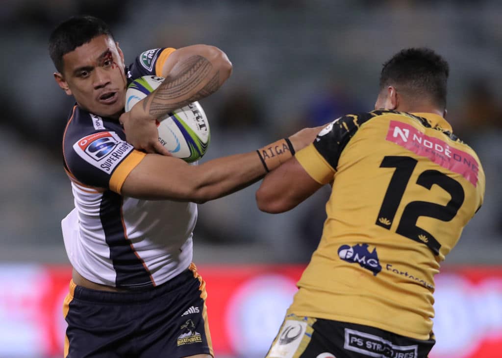 Brumbies player being tackled by Force player