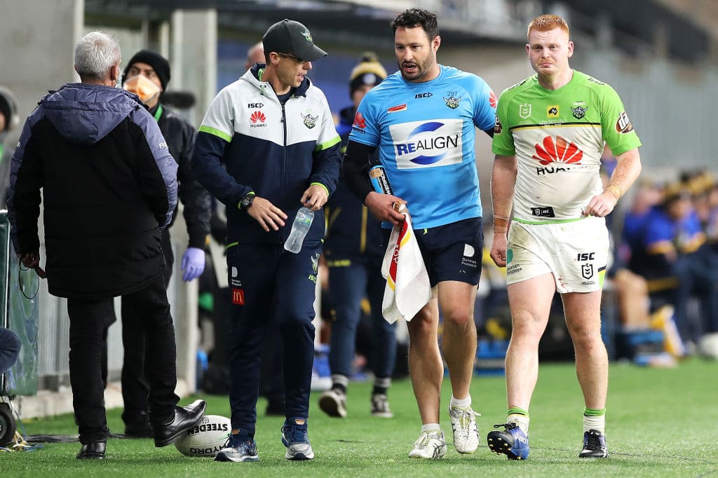 SYDNEY, AUSTRALIA - JUNE 27: Corey Horsburgh of the Raiders leaves the field with the trainer during the round seven NRL match between the Parramatta Eels and the Canberra Raiders at Bankwest Stadium on June 27, 2020 in Sydney, Australia. (Photo by Mark Kolbe/Getty Images)