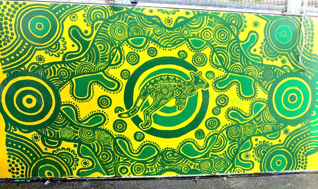 green and gold aboriginal artwork