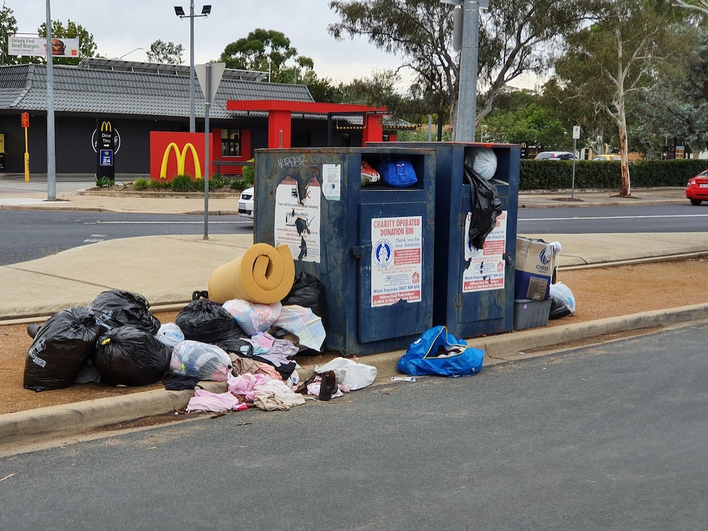 Two new sites will replace Canberra's charity bins, closed after illegal dumping last year, like at this one at Weston Creek.