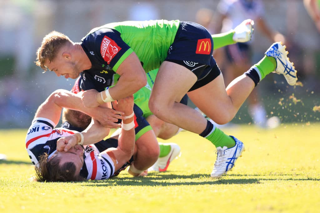QUEANBEYAN, AUSTRALIA - FEBRUARY 27: Angus Crichton of the Roosters is tackled by Hudson Young of the Raiders during the NRL trial Match between the Sydney Roosters and the Canberra Raiders at Seiffert Oval on February 27, 2021 in Queanbeyan, Australia. (Photo by Mark Evans/Getty Images)