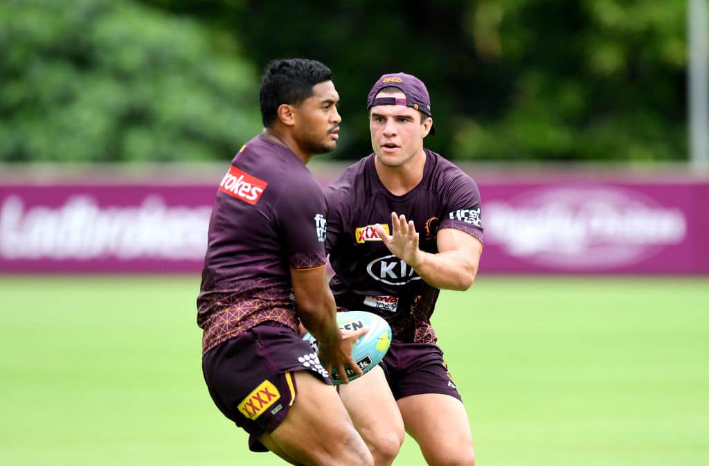 BRISBANE, AUSTRALIA - FEBRUARY 11: Anthony Milford takes on the defence of Brodie Croft during a Brisbane Broncos NRL training session on February 11, 2020 in Brisbane, Australia. (Photo by Bradley Kanaris/Getty Images)