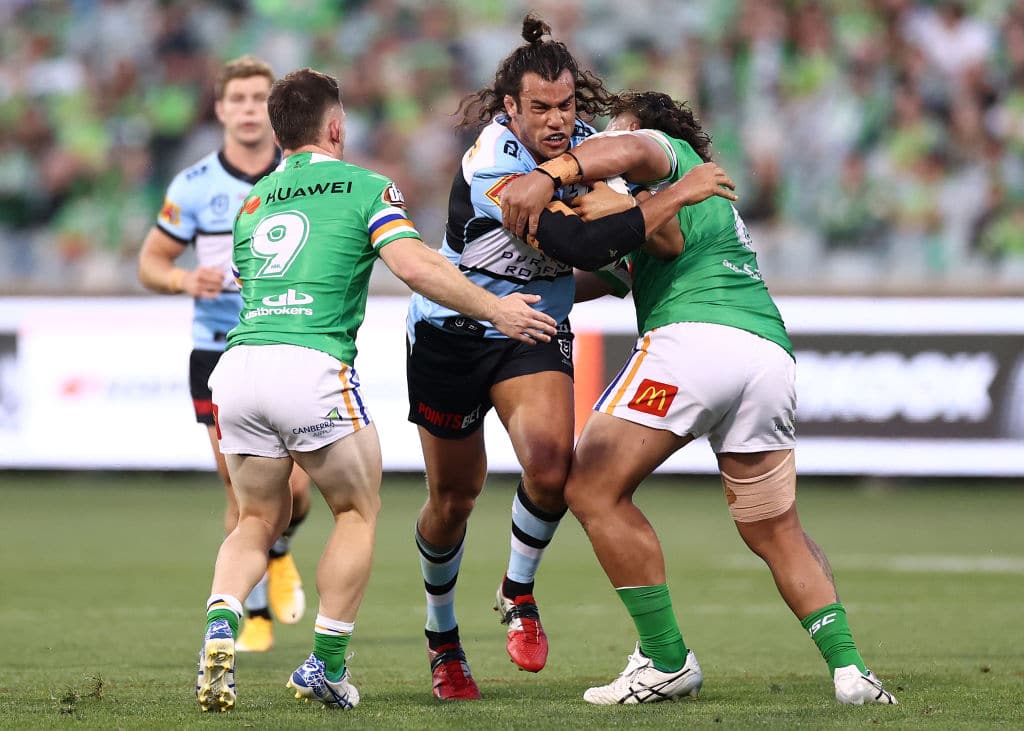 CANBERRA, AUSTRALIA - OCTOBER 03: Toby Rudolf of the Sharks is tackled during the NRL Elimination Final match between the Canberra Raiders and the Cronulla Sharks at GIO Stadium on October 03, 2020 in Canberra, Australia. (Photo by Cameron Spencer/Getty Images)