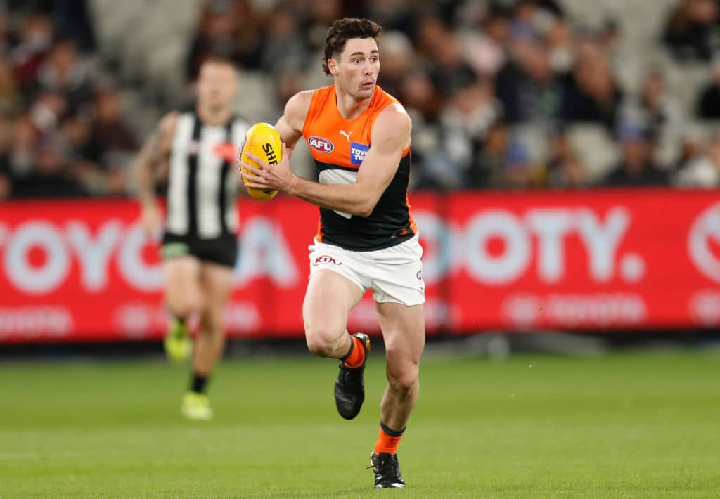 MELBOURNE, AUSTRALIA - APRIL 10: Lachie Ash of the Giants in action during the 2021 AFL Round 04 match between the Collingwood Magpies and the GWS Giants at the Melbourne Cricket Ground on April 10, 2021 in Melbourne, Australia. (Photo by Michael Willson/AFL Photos via Getty Images)