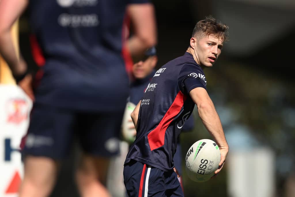 SYDNEY, AUSTRALIA - MARCH 29: Sam Walker passes during a Sydney Roosters NRL training session at Kippax Lake on March 29, 2021 in Sydney, Australia. (Photo by Matt King/Getty Images)