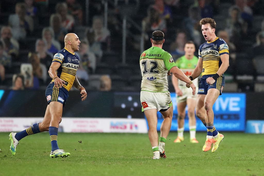 SYDNEY, AUSTRALIA - JUNE 27: Clinton Gutherson of the Eels celebrates kicking the winning field goal in golden point time during the round seven NRL match between the Parramatta Eels and the Canberra Raiders at Bankwest Stadium on June 27, 2020 in Sydney, Australia. (Photo by Mark Kolbe/Getty Images)