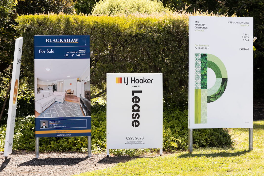Anglicare rental snapshot: for sale and for lease signs outside a unit block