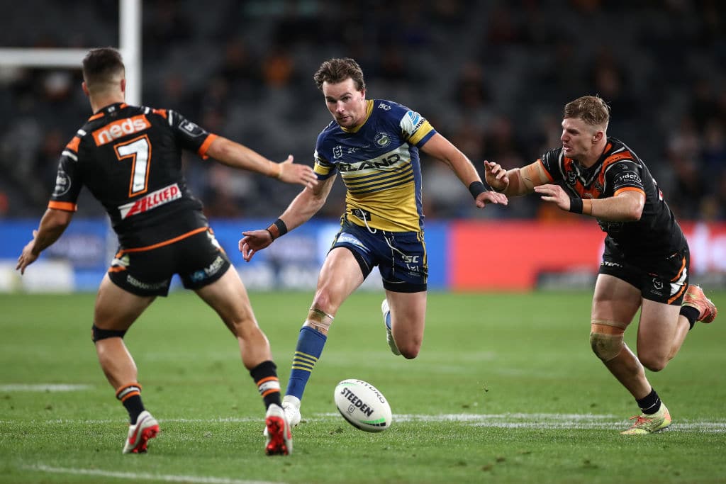 SYDNEY, AUSTRALIA - SEPTEMBER 26: Clinton Gutherson of the Eels kicks the ball during the round 20 NRL match between the Wests Tigers and the Parramatta Eels at Bankwest Stadium on September 26, 2020 in Sydney, Australia. (Photo by Cameron Spencer/Getty Images)