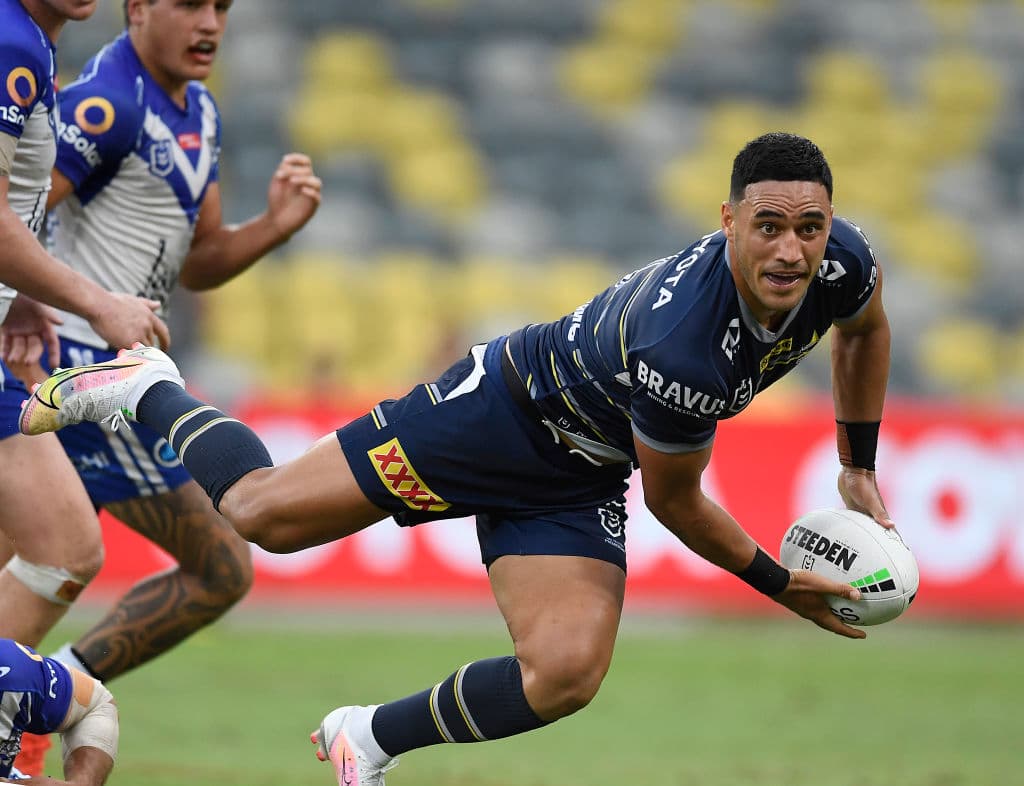 TOWNSVILLE, AUSTRALIA - APRIL 18:  Valentine Holmes of the Cowboys passes the ball during the round six NRL match between the North Queensland Cowboys and the Canterbury Bulldogs at QCB Stadium, on April 18, 2021, in Townsville, Australia. (Photo by Ian Hitchcock/Getty Images)
