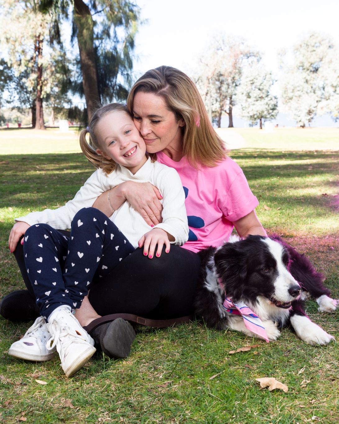 Mother's Day Canberra - Mother's Day Classic Ambassador Louise Momber with daughter Ivy and dog Millie. 