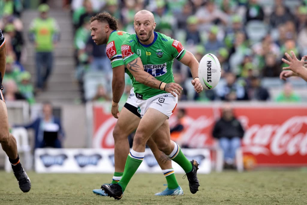 CANBERRA, AUSTRALIA - MARCH 14:Josh Hodgson of the Raiders passes the ball during the round 1 NRL match between the Canberra Raiders and Wests Tigers at GIO Stadium on March 14, 2021 in Canberra, Australia. (Photo by Speed Media/Icon Sportswire via Getty Images)
