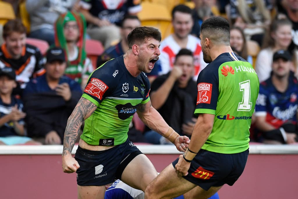 BRISBANE, AUSTRALIA - MAY 15: Curtis Scott of the Raiders celebrates with team mates after scoring a try during the round 10 NRL match between the Canterbury Bulldogs and the Canberra Raiders at Suncorp Stadium, on May 15, 2021, in Brisbane, Australia. (Photo by Albert Perez/Getty Images)