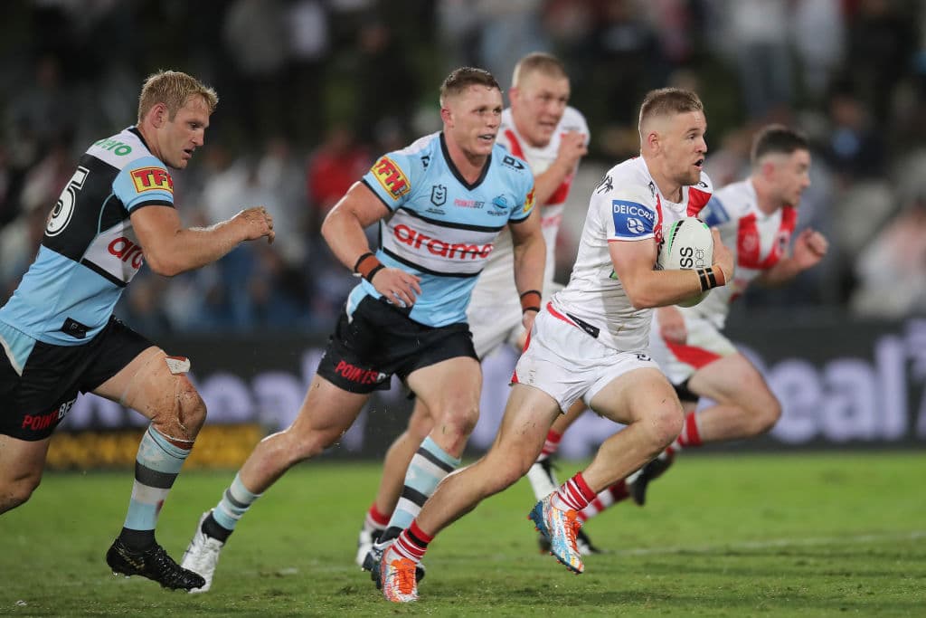 SYDNEY, AUSTRALIA - MARCH 14: Matt Dufty of the Dragons makes a break during the round one NRL match between the St George Illawarra Dragons and the Cronulla Sharks at Netstrata Jubilee Stadium, on March 14, 2021, in Sydney, Australia. (Photo by Matt King/Getty Images)