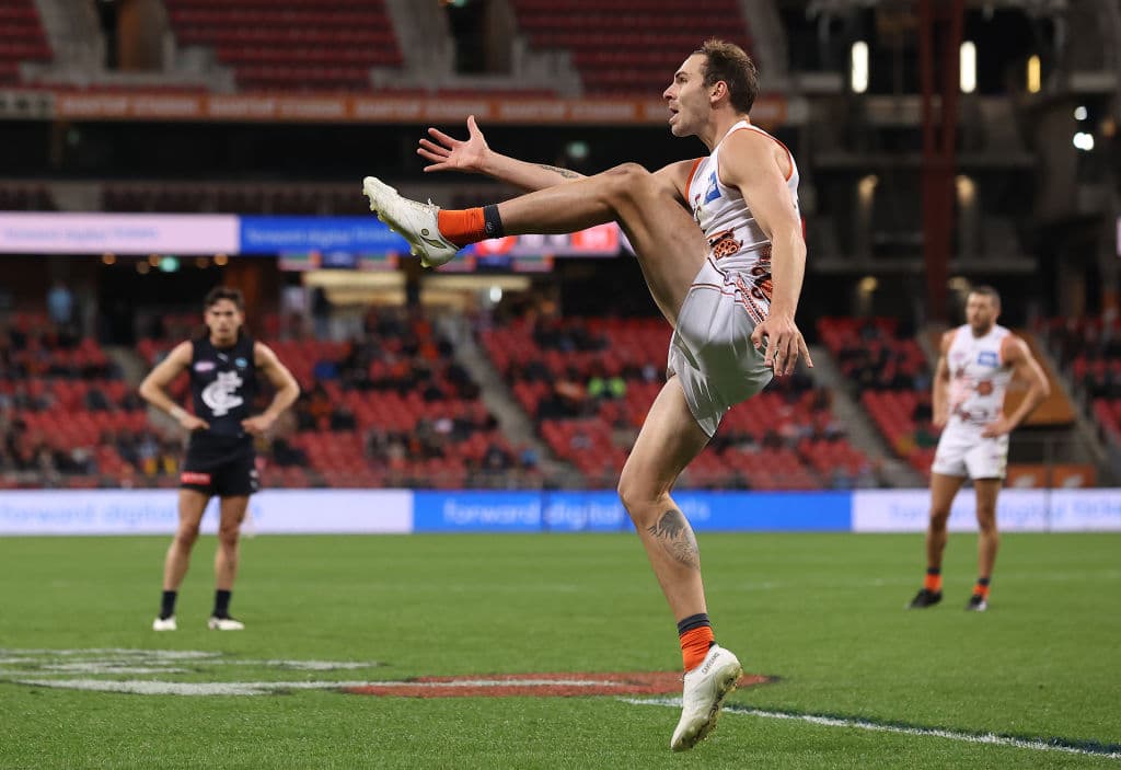 SYDNEY, AUSTRALIA - JUNE 19: Jeremy Finlayson of the Giants kicks for goal during the round 14 AFL match between the Greater Western Sydney Giants and the Carlton Blues at GIANTS Stadium on June 19, 2021 in Sydney, Australia. (Photo by Mark Kolbe/Getty Images)