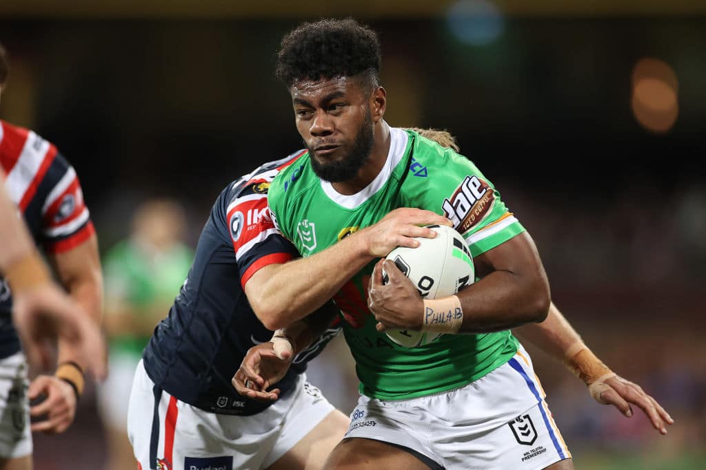 SYDNEY, AUSTRALIA - OCTOBER 09: Semi Valemei of the Raiders is tackled during the NRL Semi Final match between the Sydney Roosters and the Canberra Raiders at the Sydney Cricket Ground on October 09, 2020 in Sydney, Australia. (Photo by Cameron Spencer/Getty Images)