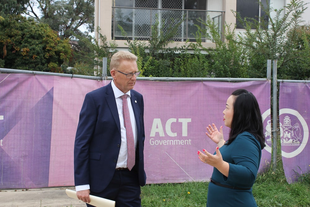 Canberra Liberals Mark Parton and Elizabeth Lee outside ACT community housing. Photo: Nick Fuller