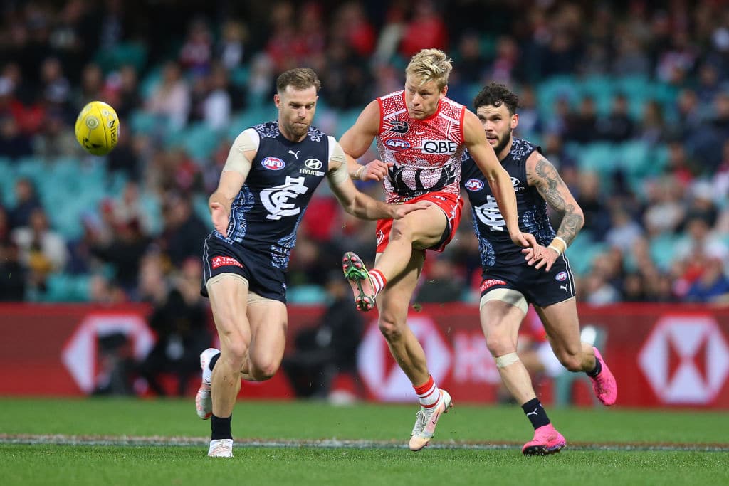 SYDNEY, AUSTRALIA - MAY 30: Isaac Heeney of the Swans kicks during the round 11 AFL match between the Sydney Swans and the Carlton Blues at Sydney Cricket Ground on May 30, 2021 in Sydney, Australia. (Photo by Jason McCawley/AFL Photos/via Getty Images)