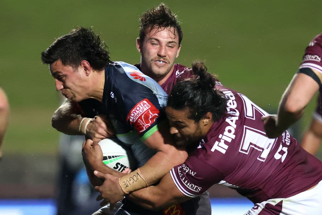 SYDNEY, AUSTRALIA - JULY 08: Joseph Tapine of the Raiders is tackled during the round 17 NRL match between the Manly Sea Eagles and the Canberra Raiders at 4 Pines Park on July 08, 2021, in Sydney, Australia. (Photo by Cameron Spencer/Getty Images)
