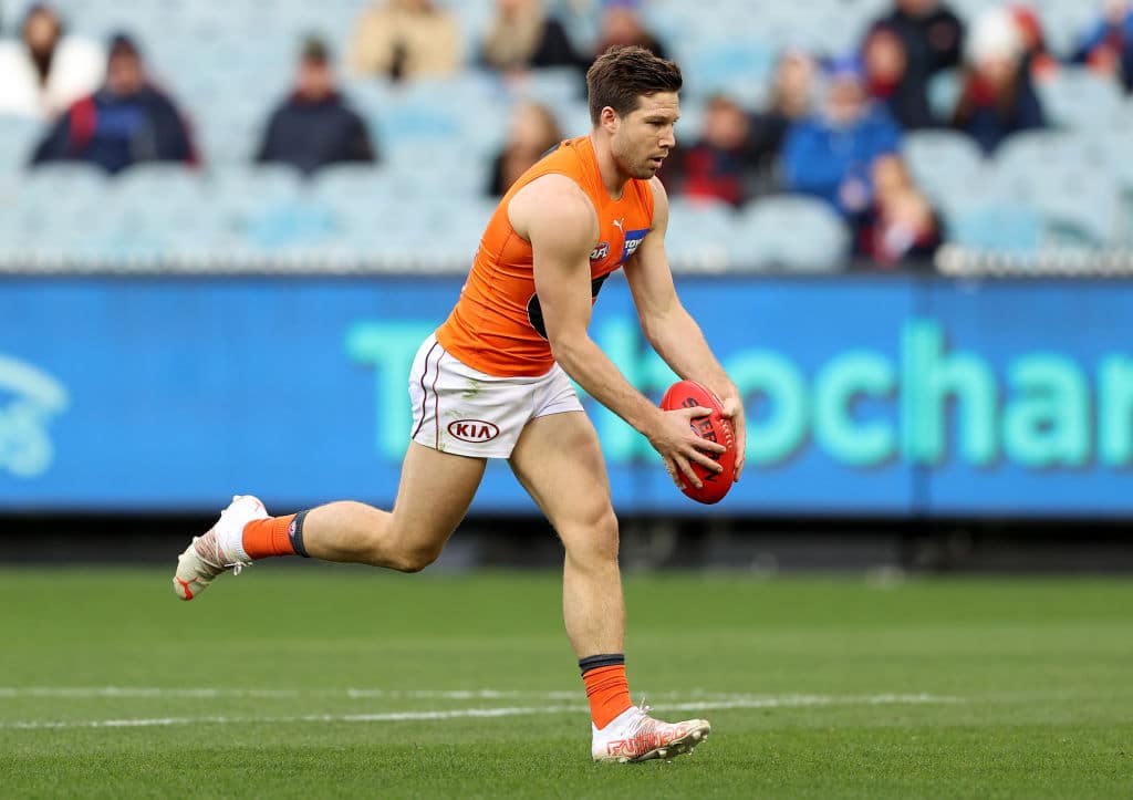 MELBOURNE, AUSTRALIA - JULY 03: Toby Greene of the Giants lines up for a kick on goal during the round 16 AFL match between Melbourne Demons and Greater Western Sydney Giants at Melbourne Cricket Ground on July 03, 2021 in Melbourne, Australia. (Photo by Robert Cianflone/Getty Images)