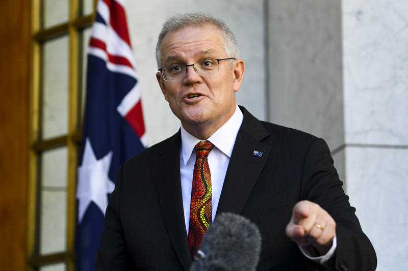 Australian Prime Minister Scott Morrison speaks to the media during a press conference at Parliament House in Canberra, Thursday, August 5, 2021.