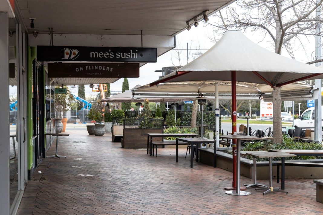 The usually bustling cafe strip at Manuka in Canberra is deserted during lockdown