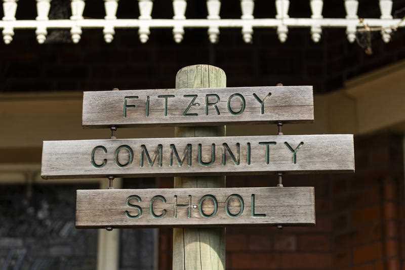 Signage for the Fitzroy Community School is seen in Fitzroy North, Melbourne