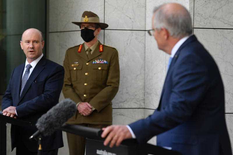 Department of Defence Secretary Greg Moriarty, Chief of the Australian Defence Force (ADF) General Angus Campbell and Prime Minister Scott Morrison at a press conference at Parliament House in Canberra
