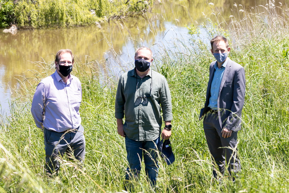 Ngunnawal water policy officer Bradley Bell (centre), with Ian Walker (left), ACT Conservator of Flora and Fauna, and Shane Rattenbury (right), ACT Minister for Water, Energy and Emissions Reduction. Photo: Kerrie Brewer