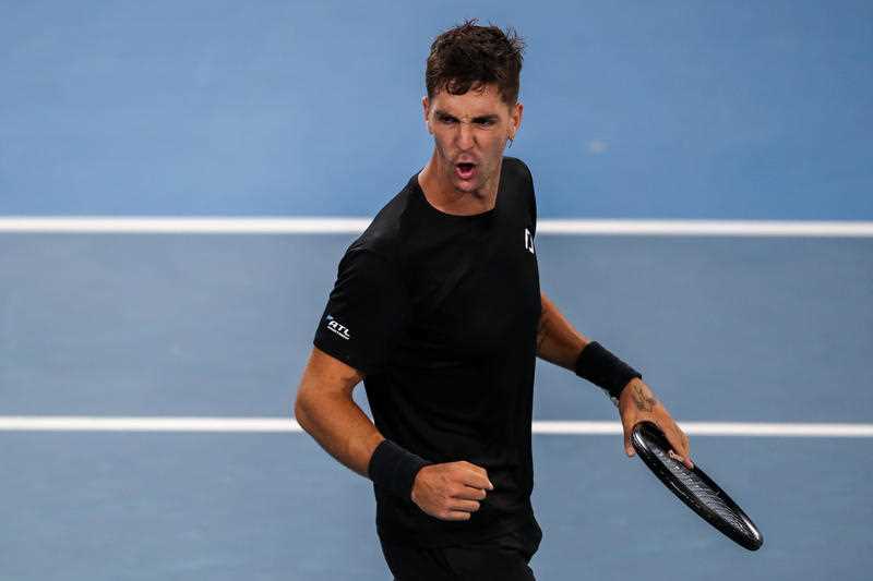 Thanasi Kokkinakis of Australia celebrates during his match with John Millman of Australia on Day 2 of the the Adelaide International Tennis Tournament, at Memorial Drive, in Adelaide, Tuesday, January 4, 2022