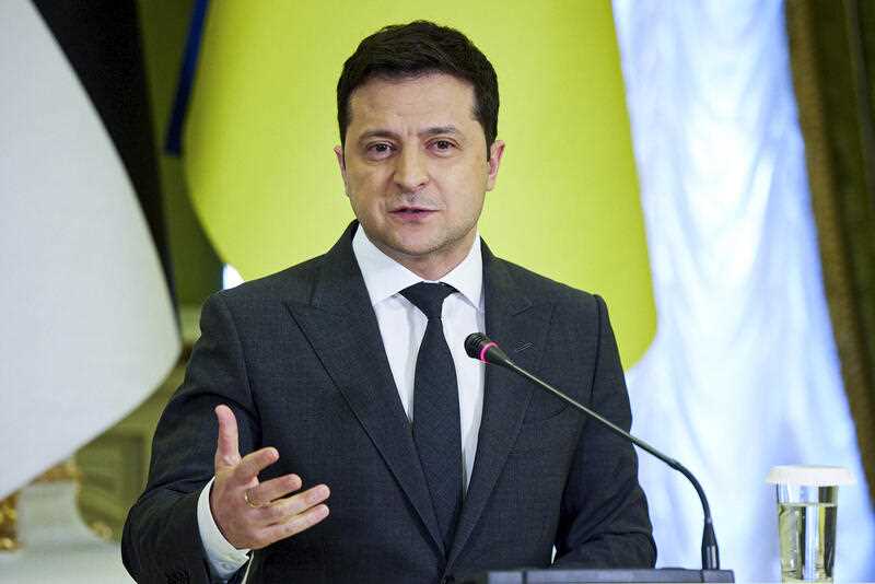 Ukrainian President Volodymyr Zelenskyy gestures during a joint news conference with Estonian President Alar Karis following their talks in Kyiv, Ukraine, Tuesday, Feb. 22, 2022