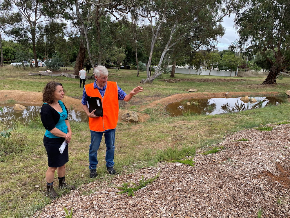 Rebecca Vassarotti, ACT Minister for the Environment, and Chris Mobs, convener of the Bragg Street Park Volunteers. Photo provided.